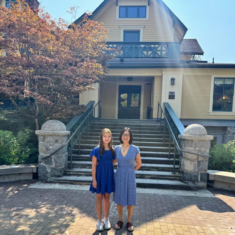 Michelle and Camille standing in front of the steps of Crofton House&rsquo;s Old Residence
